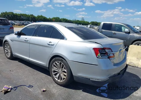 2015 Ford Taurus Limited z USA, uszkodzony, nr VIN 1FAHP2F84FG141490